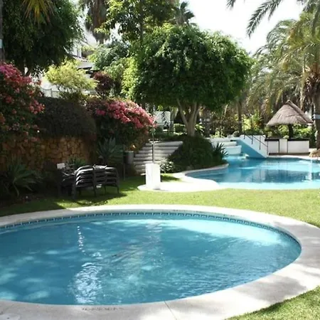 Apartment Beachfront Development With Tropical Gardens.
